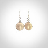 Hand made woolly mammoth tusk moon face earrings. Made by NZ Pacific and sale online only.